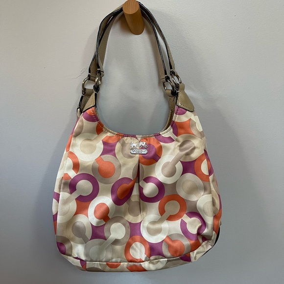 Coach Handbags - Coach Cream, Orange, and Purple Patterned Shoulder Bag